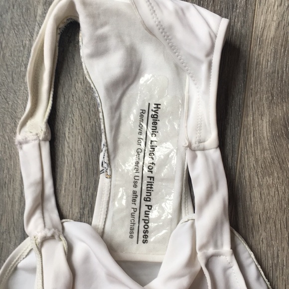 8/15 White bikini bottoms with gold emblem - Picture 3 of 4